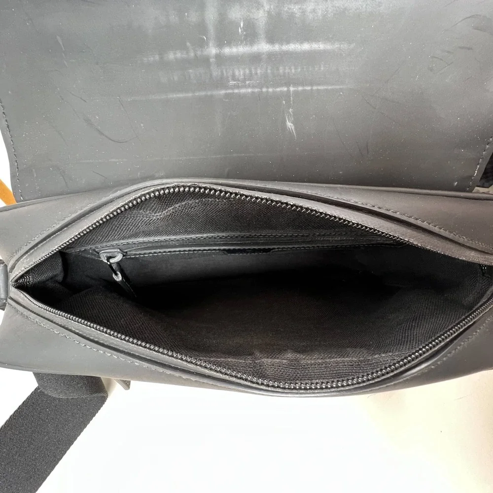 Gucci Black GG Rubber-Effect Leather Messenger Bag